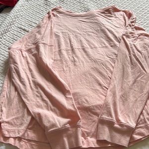 Pink oversized jersey shirt.
